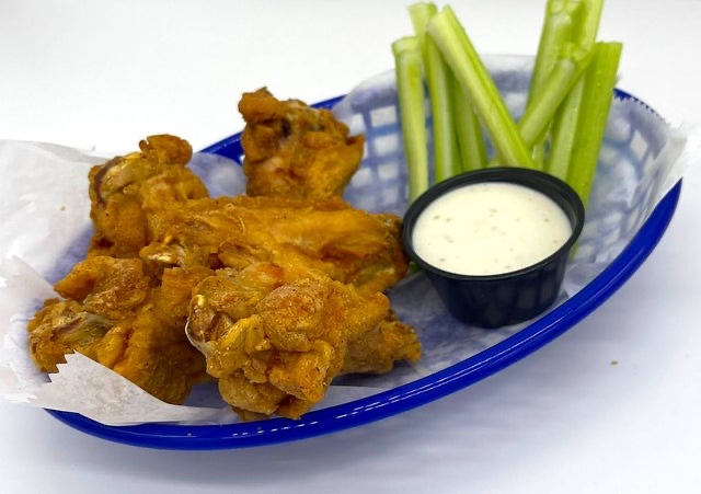 Wings with YOUR CHOICE of Sauce with Celery at BITES Food Court + Bar, Langley Park